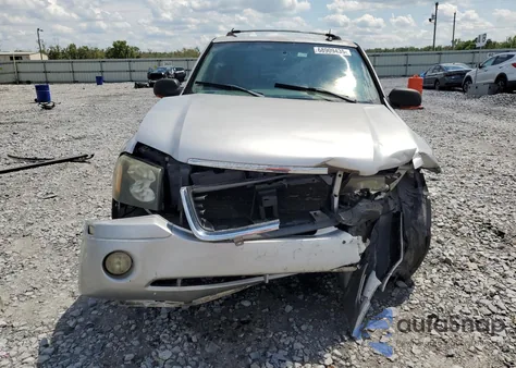 2004 GMC Envoy из США, поврежденный, VIN 1GKDS13S242340988